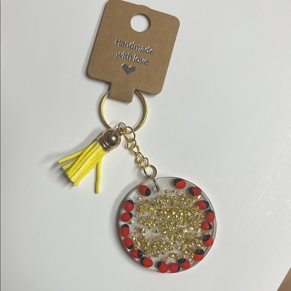 Huayruros Handmade keychains. Chakra, Luck, Protection and Prosperity